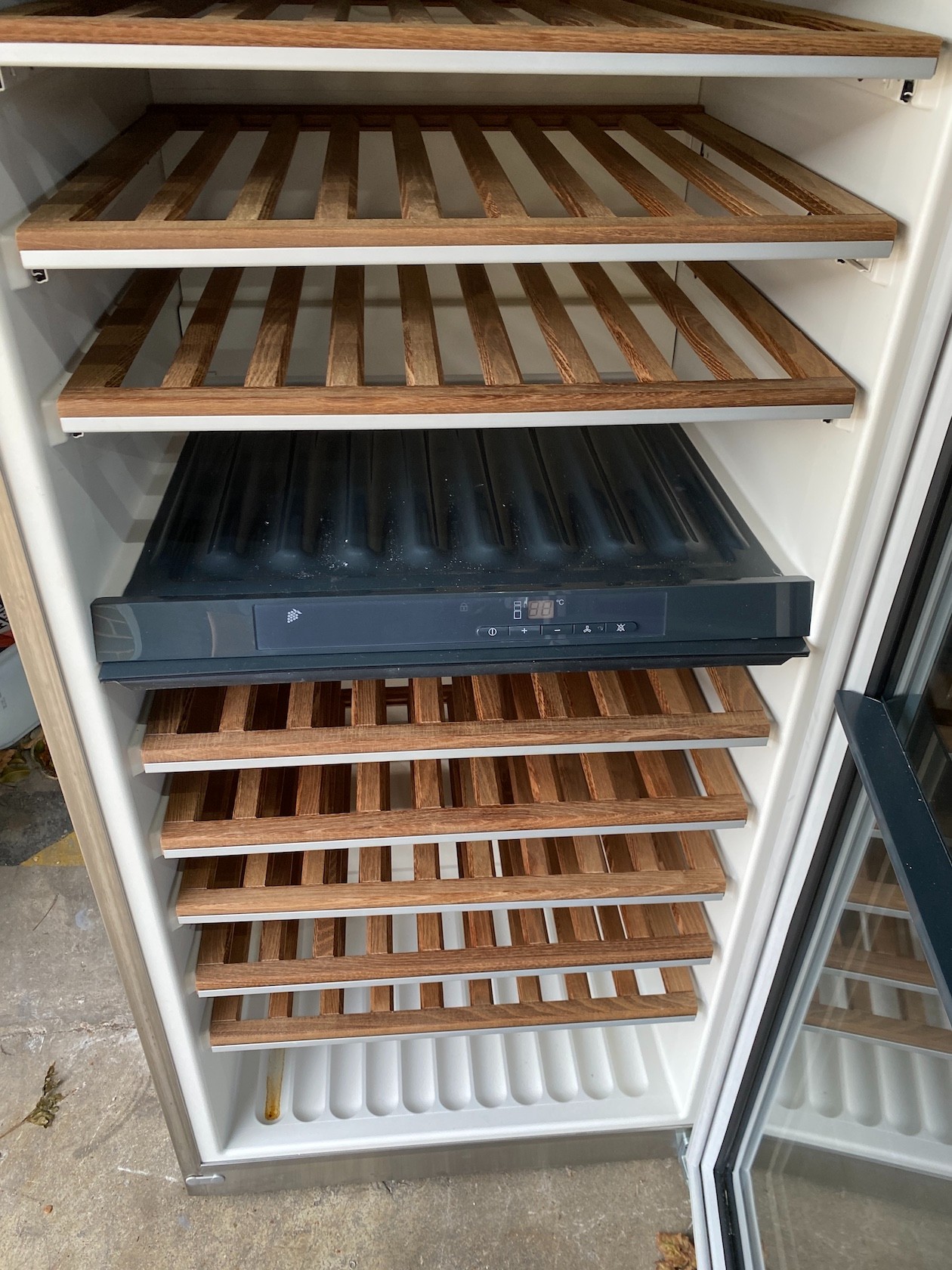 A Miele free standing wine storage fridge, (Pat tested), width 65cm, depth 66cm, height 184cm